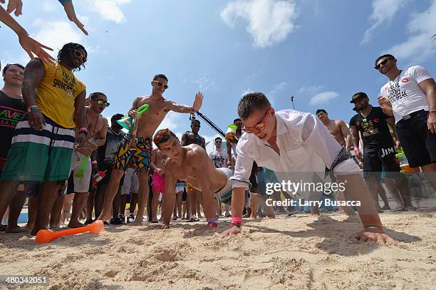 Spring breakers attend mtvU Spring Break 2014 at the Grand Oasis Hotel on March 21, 2014 in Cancun, Mexico. "mtvU Spring Break" starts airing March...