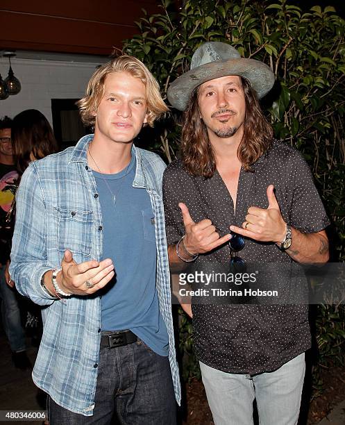 Cody Simpson, Cisco Adler attend Simpson's album party for 'Free' at Tropicana Bar at The Hollywood Roosevelt Hotel on July 10, 2015 in Hollywood,...