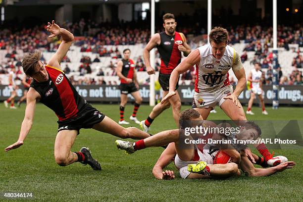 Jack Viney of the Demons gathers the ball during the round 15 AFL match between the Essendon Bombers and the Melbourne Demons at Melbourne Cricket...