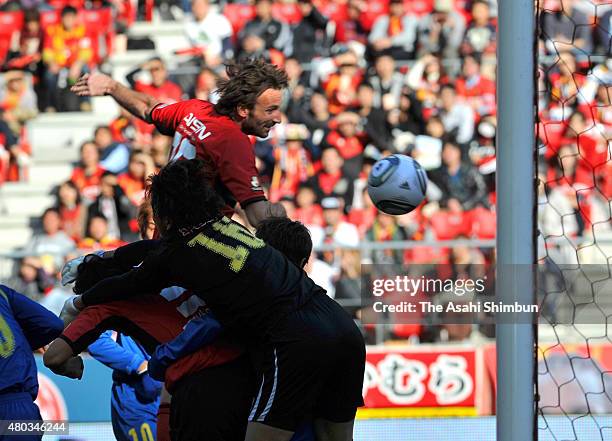 Joshua Kennedy of Nagoya Grampus scores his team's first goal during the J.League match between Nagoya Grampus and Montedio Yamagata at Toyota...