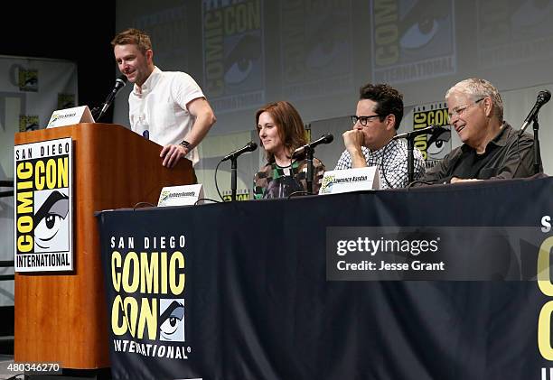 Moderator Chris Hardwick, producer Kathleen Kennedy, director J.J. Abrams and screenwriter Lawrence Kasdan at the Hall H Panel for "Star Wars: The...