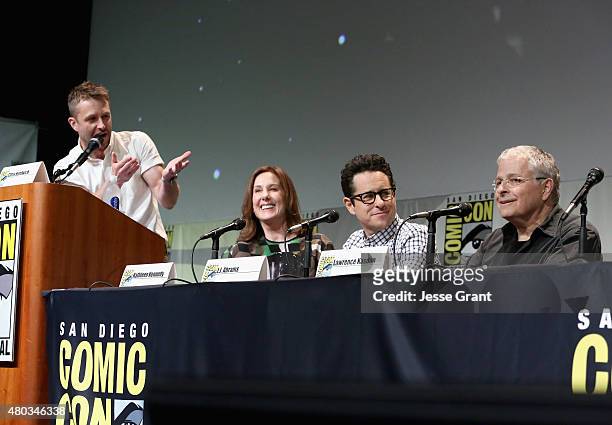 Moderator Chris Hardwick, producer Kathleen Kennedy, director J.J. Abrams and screenwriter Lawrence Kasdan at the Hall H Panel for "Star Wars: The...