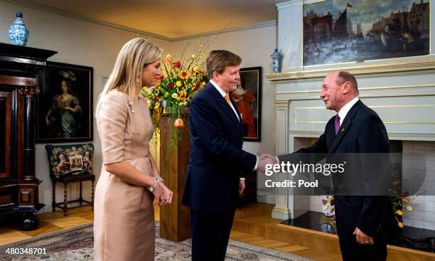 King Willem-Alexander of The Netherlands and Queen Maxima of The Netherlands greet Romanian President Traian Basescu at the Royal Palace Huis ten...