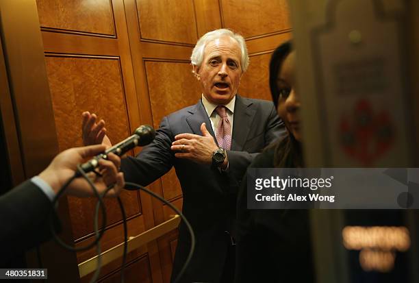Sen. Bob Corker talks to reporters as he leaves the Senate Chamber after a vote March 24, 2014 on Capitol Hill in Washington, DC. The Senate has...