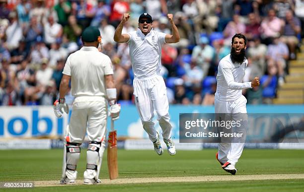 Captain Alastair Cook and bowler Moeen Ali celebrate after dismissing Australia batsman David Warner during day four of the 1st Investec Ashes Test...