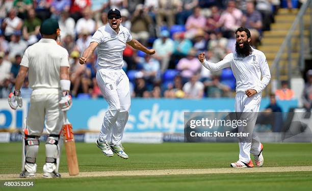 Captain Alastair Cook and bowler Moeen Ali celebrate after dismissing Australia batsman David Warner during day four of the 1st Investec Ashes Test...