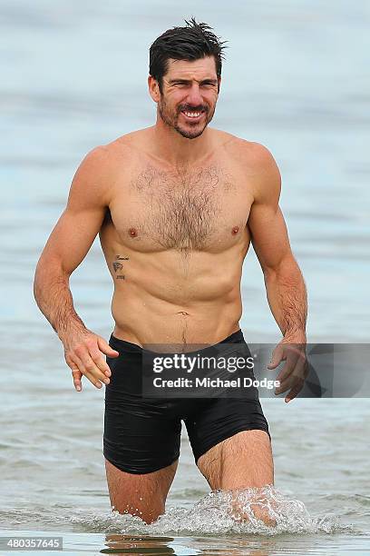 Quinten Lynch looks on during a Collingwood Magpies AFL recovery session at St Kilda Sea Baths on March 25, 2014 in Melbourne, Australia.