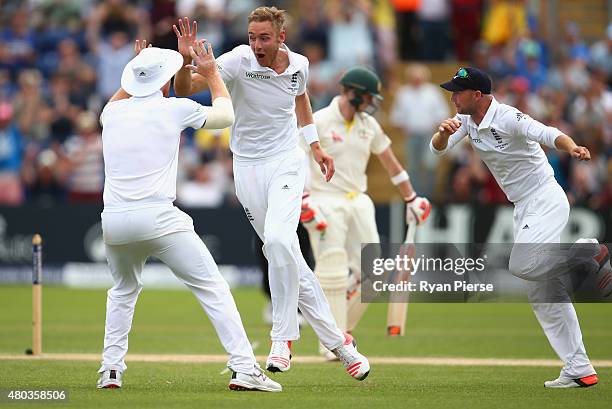 Stuart Broad of England celebrates after taking the wicket of Steve Smith of Australia during day four of the 1st Investec Ashes Test match between...