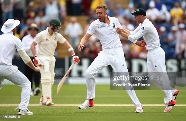 Stuart Broad of England celebrates after taking the wicket of Steve Smith of Australia during day four of the 1st Investec Ashes Test match between...