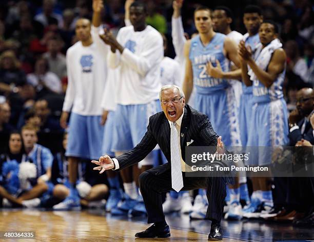 Head coach Roy Williams of the North Carolina Tar Heels reacts during the third round of the 2014 NCAA Men's Basketball Tournament against the Iowa...