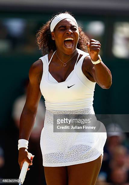 Serena Williams of the United States celebrates winning a point in the Final Of The Ladies' Singles against Garbine Muguruza of Spain during day...