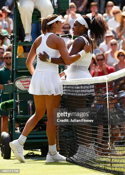 Serena Williams of the United States celebrates at the net after winning the Final Of The Ladies' Singles against Garbine Muguruza of Spain during...