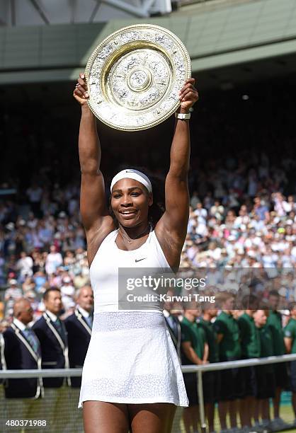 Serena Williams of the United States celebrates with the Venus Rosewater Dish after her victory in the Final Of The Ladies' Singles against Garbine...