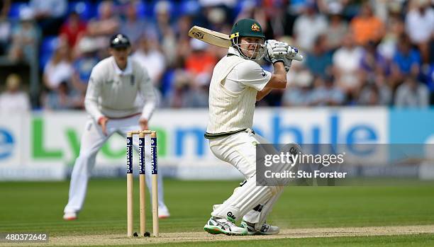 Australia batsman Shane Watson hits out during day four of the 1st Investec Ashes Test match between England and Australia at SWALEC Stadium on July...