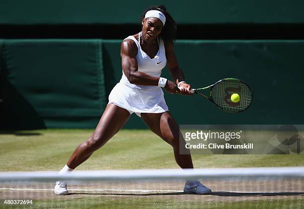Serena Williams of the United States plays a backhand in the Final Of The Ladies' Singles against Garbine Muguruza of Spain during day twelve of the...