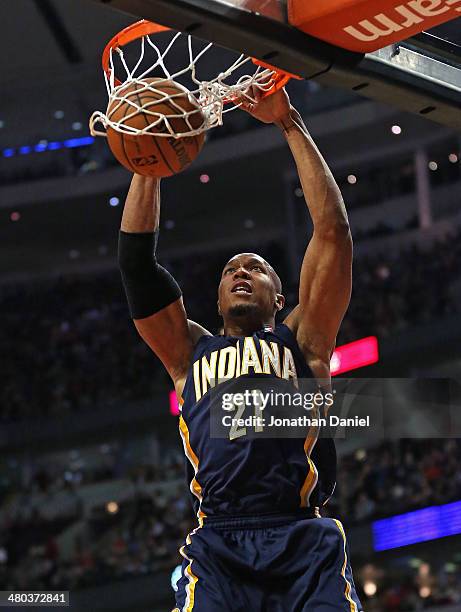 David West of the Indiana Pacers dunks against the Chicago Bulls at the United Center on March 24, 2014 in Chicago, Illinois. The Bulls defeated the...