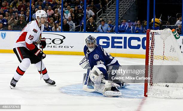 Jason Spezza of the Ottawa Senators scores in a shoot out past Ben Bishop of the Tampa Bay Lightning at the Tampa Bay Times Forum on March 24, 2014...