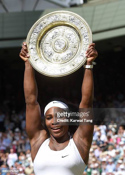 Serena Williams celebrates with the Venus Rosewater Dish after her victory in the Final Of The Ladies' Singles against Garbine Muguruza of Spain...