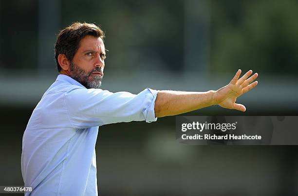 Watford head coach Quique Sanchez Flores during the Pre Season Friendly match between AFC Wimbledon and Watford at The Cherry Red Records Stadium on...