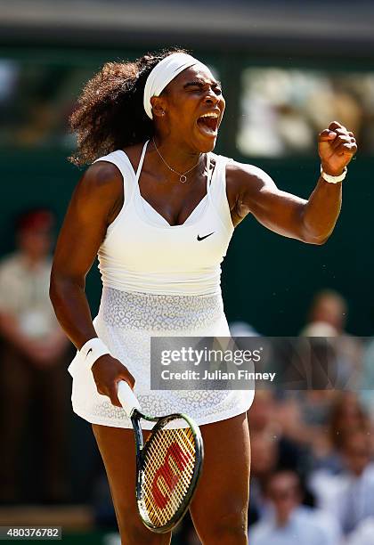 Serena Williams of the United States celebrates winning a point in the Final Of The Ladies' Singles against Garbine Muguruza of Spain during day...