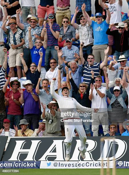 England fielder Joe Root celebrates after catching Australia batsman Josh Hazlewood to win the match during day four of the 1st Investec Ashes Test...