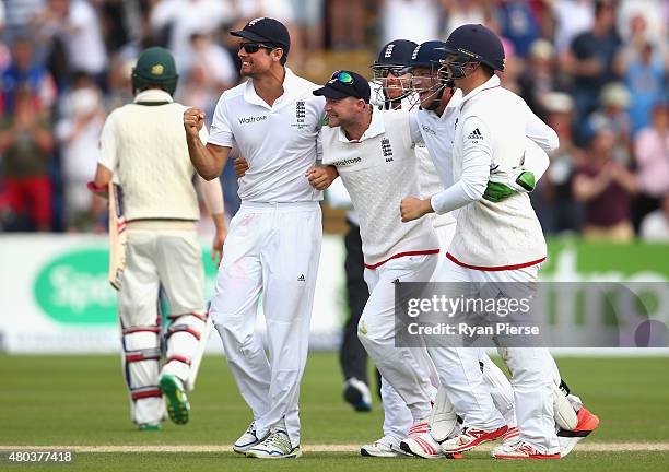 Alastair Cook of England and England players celebrate victory during day four of the 1st Investec Ashes Test match between England and Australia at...