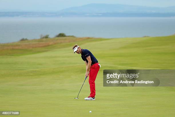 Raphael Jacquelin of France putts on the 15th green during the third round of the Aberdeen Asset Management Scottish Open at Gullane Golf Club on...