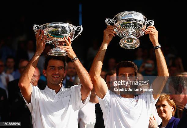 Jean-Julien Rojer of Netherlands and Horia Tecau of Romania celebrate after winning the Final Of The Gentlemen's Doubles against John Peers of...