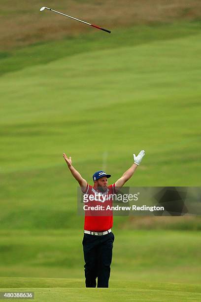 Andrew Johnston of England celebrates after holing his second shot to make an eagle on the 18th hole during the third round of the Aberdeen Asset...