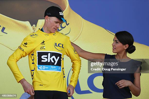 Chris Froome of Great Britain and Team Sky celebrates as he retains the yellow jersey following stage eight of the 2015 Tour de France, a 181.5km...