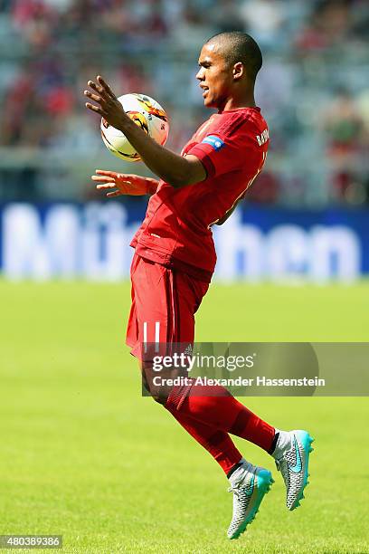 Douglas Coste battles for the ball during a FC Bayern Muenchen training session after the FC Bayern Muenchen season opening and team presentation at...