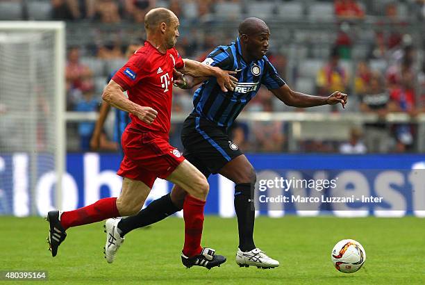 David Suazo of Inter Forever is challenged by Hans Pflugler of FCB AllStars during the friendly match between FCB AllStars and Inter Forever at...