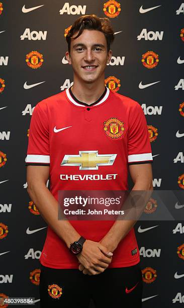 Matteo Darmian of Manchester United poses after signing for the club at Aon Training Complex on July 11, 2015 in Manchester, England.