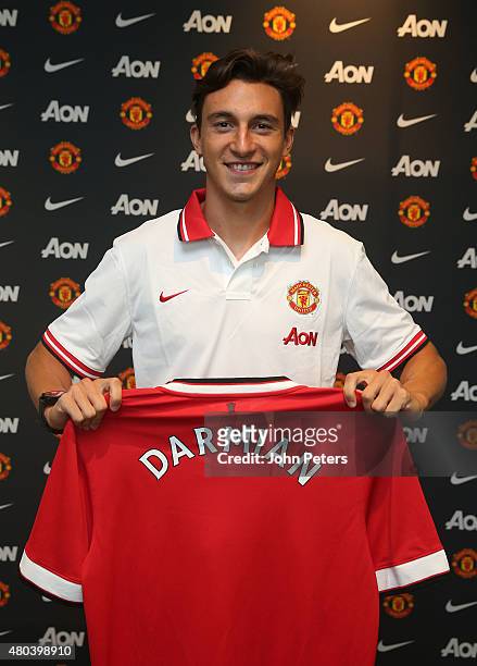 Matteo Darmian of Manchester United poses after signing for the club at Aon Training Complex on July 11, 2015 in Manchester, England.