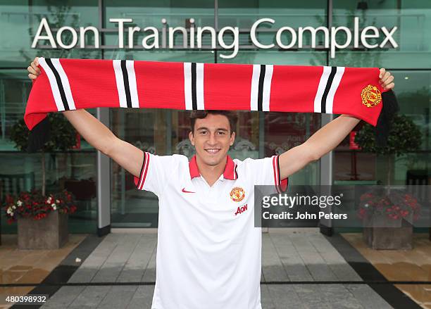 Matteo Darmian of Manchester United poses after signing for the club at Aon Training Complex on July 11, 2015 in Manchester, England.