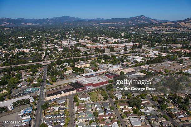 The Highway 101 freeway is viewed from the air as it passes through downtown on June 22 over Santa Rosa, California. Growth has become a major...