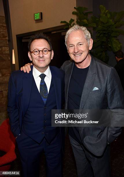 Actors Michael Emerson and Victor Garber attend the Getty Images Portrait Studio Powered By Samsung Galaxy At Comic-Con International 2015 at Hard...