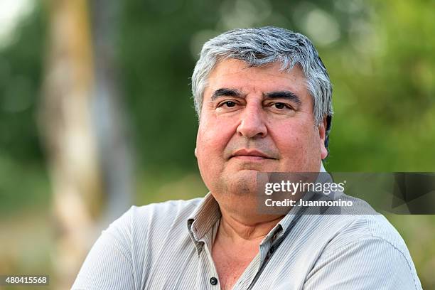 mature hispanic man - chubby stock pictures, royalty-free photos & images
