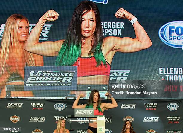 Angela Magana steps onto the scale during the TUF 21 Finale Weigh-in at the UFC Fan Expo in the Sands Expo and Convention Center on July 11, 2015 in...