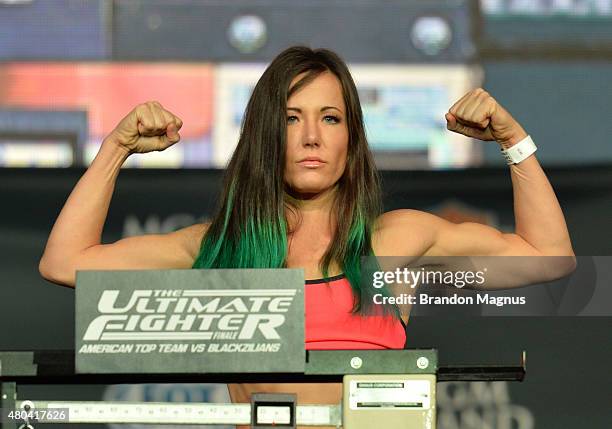 Angela Magana steps onto the scale during the TUF 21 Finale Weigh-in at the UFC Fan Expo in the Sands Expo and Convention Center on July 11, 2015 in...