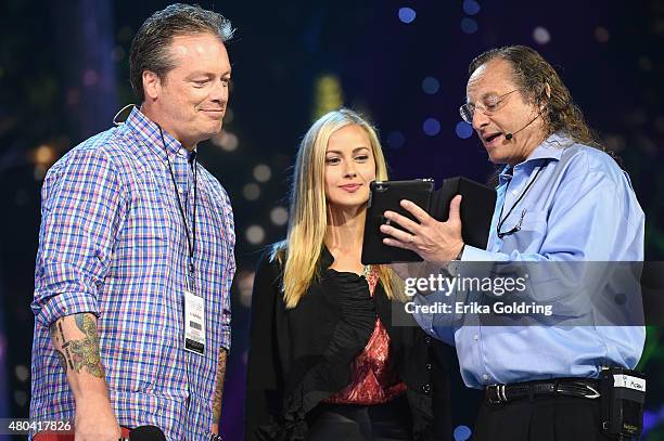 Todd Newton and Alex Wehrley rehearse onstage during the 2015 Miss USA Pageant Rehearsals at The Baton Rouge River Center on July 11, 2015 in Baton...