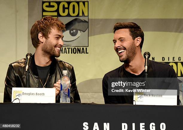 Actors Douglas Booth and Jack Huston speak onstage at the Screen Gems panel for "Patient Zero" and "Pride and Prejudice and Zombies" during Comic-Con...