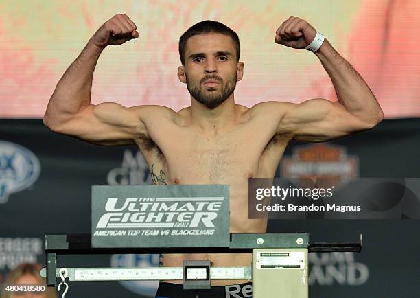 Darrell Montague steps onto the scale during the TUF 21 Finale Weigh-in at the UFC Fan Expo in the Sands Expo and Convention Center on July 11, 2015...