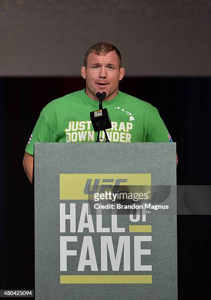 Matt Hughes gives his introduction speech for BJ Penn before he is inducted into the UFC Hall of Fame at the UFC Fan Expo in the Sands Expo and...
