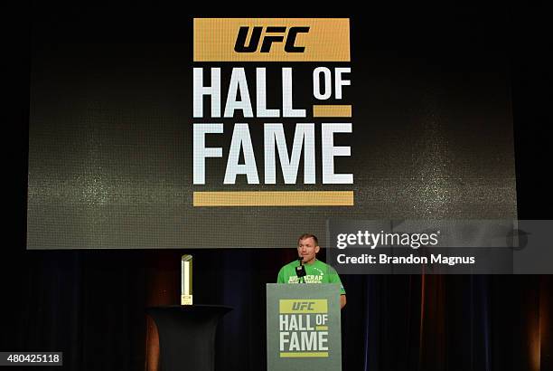 Matt Hughes gives his introduction speech for BJ Penn before he is inducted into the UFC Hall of Fame at the UFC Fan Expo in the Sands Expo and...