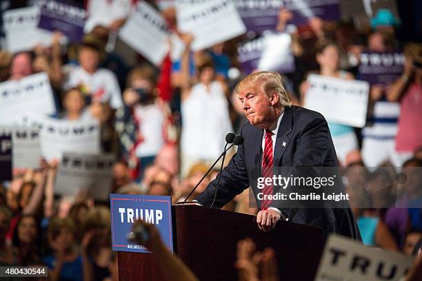 Republican Presidential candidate Donald Trump addresses supporters during a political rally at the Phoenix Convention Center on July 11, 2015 in...