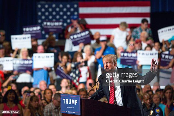 Republican Presidential candidate Donald Trump addresses supporters during a political rally at the Phoenix Convention Center on July 11, 2015 in...