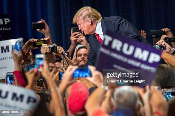 Republican Presidential candidate Donald Trump addresses supporters during a political rally at the Phoenix Convention Center on July 11, 2015 in...