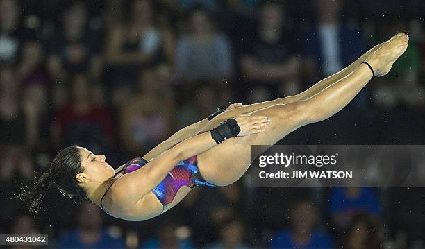 Ingrid De Oliveira of Brazil competes in the Womens 10m Platform finals at the 2015 Pan American Games in Toronto, Canada, July 11, 2015. AFP PHOTO /...