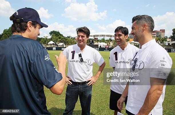 Jari Litmanen, Michael Laudrup, Paulo Ferreira and Vitor Baia in discussion during the Laureus All Stars Unity Cup ahead of the 2014 Laureus World...